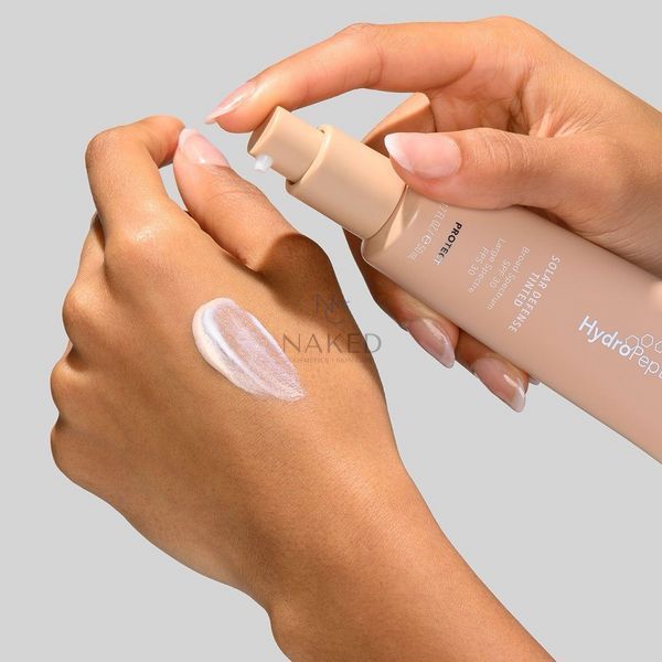 Сонцезахисний крем для обличчя HydroPeptide Solar Defense Tinted SPF30 15 ml 000681 фото
